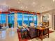 Elegant living room with ocean views, stylish furniture, and bright, open space at 655 Longboat Club Rd # 16B, Longboat Key, FL 34228