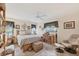Calm bedroom with neutral decor, ceiling fan, and a dedicated workspace for a peaceful retreat at 7223 Wood Creek Dr # 22, Sarasota, FL 34231