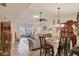 Open-concept dining area seamlessly connecting to the living room and lanai at 7223 Wood Creek Dr # 22, Sarasota, FL 34231