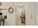 Bright hallway with tile flooring and elegant decor, connecting the living spaces at 7223 Wood Creek Dr # 22, Sarasota, FL 34231