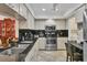 Well-equipped kitchen has granite counters, stainless steel appliances, and white cabinets offering ample storage at 7223 Wood Creek Dr # 22, Sarasota, FL 34231