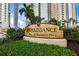 The Renaissance at Rosemary Place community sign is surrounded by lush greenery and landscaping at 750 N Tamiami Trl # 604, Sarasota, FL 34236