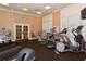 Well-lit gym featuring treadmills, elliptical machines, and fitness equipment at 750 N Tamiami Trl # 604, Sarasota, FL 34236