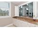 Kitchenette features stone countertops, lots of cabinet space, a window, and a pass-through at 750 N Tamiami Trl # 604, Sarasota, FL 34236