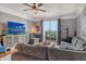 Inviting living room with comfortable seating, scenic views from the balcony, and a relaxing ambiance at 750 N Tamiami Trl # 604, Sarasota, FL 34236