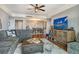 Comfortable living room featuring a plush sectional sofa and an adjacent dining area at 750 N Tamiami Trl # 604, Sarasota, FL 34236