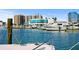 Scenic view of a marina showing yachts and buildings in an urban setting with clear blue water at 750 N Tamiami Trl # 604, Sarasota, FL 34236