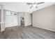 Spacious living room with new wood floors and a double door entry at 7604 49Th E Ave, Bradenton, FL 34203
