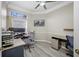 This home office has two desks, a computer and monitor, and plenty of space to work at 7604 49Th E Ave, Bradenton, FL 34203