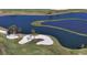 Scenic golf course view featuring sand traps and a serene lake, perfect for golfers at 8025 Via Fiore, Sarasota, FL 34238