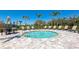 This spa is perfect for relaxing outdoors with comfortable seating, lush landscaping, and a serene atmosphere at 8262 Velda Trl, Sarasota, FL 34241