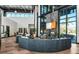 Spacious lobby area boasts high ceilings, large windows, and comfortable seating arrangements at 8262 Velda Trl, Sarasota, FL 34241