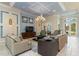 This comfortable Soleil lounge features elegant furnishings, neutral decor, and upscale finishes at 8323 Enclave Way # 104, Sarasota, FL 34243