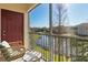 Inviting screened porch offering tranquil water views and comfortable seating, perfect for relaxation at 8323 Enclave Way # 104, Sarasota, FL 34243
