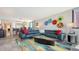 Living room area featuring comfortable seating and an open floor plan at 97 Sunset Dr # 203, Sarasota, FL 34236