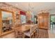 Formal dining room with elegant chandelier, formal table, and chairs at 6156 41St E St, Bradenton, FL 34203