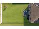 An aerial view of a beautiful backyard, showcasing an outdoor seating area at 10905 Copperlefe Dr, Bradenton, FL 34212