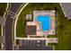 A community pool with lounge chairs, palm trees, parking, and a gazebo at 10905 Copperlefe Dr, Bradenton, FL 34212