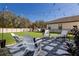 Inviting backyard with patio, chairs, and lush green grass for outdoor gatherings at 10905 Copperlefe Dr, Bradenton, FL 34212