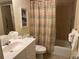Bathroom featuring shower and tub combination, vanity and neutral decor at 1257 S Portofino Dr # 208, Sarasota, FL 34242