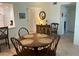 Bright dining area with seating for four with view of updated kitchen at 1257 S Portofino Dr # 208, Sarasota, FL 34242