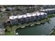 Waterfront condo building with boat slips, showcasing the building's architecture and community layout at 1257 S Portofino Dr # 208, Sarasota, FL 34242