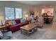 Spacious living room with dining area, work space, comfortable seating, and great natural light at 1257 S Portofino Dr # 208, Sarasota, FL 34242