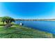Enjoy serene lake views from this home with lush landscaping and a tranquil setting at 13228 Saw Palm Creek Trl, Lakewood Ranch, FL 34211