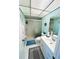 This bathroom features a shower and single sink at 1412 56Th W St # 1412, Bradenton, FL 34209