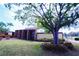 Charming single-story villa with a mix of stone and siding, complemented by manicured landscaping at 1412 56Th W St # 1412, Bradenton, FL 34209