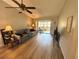 Inviting living room featuring new vinyl flooring, a cozy sofa and neutral paint at 1412 56Th W St # 1412, Bradenton, FL 34209
