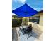 Back patio with outdoor table and chairs at 1412 56Th W St # 1412, Bradenton, FL 34209