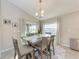 Dining area with natural light, table and chairs, and stylish decor at 16419 62Nd E Gln, Parrish, FL 34219