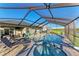 Enjoy the Florida lifestyle with your screened pool and outdoor entertaining area at 16419 62Nd E Gln, Parrish, FL 34219