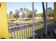 Scenic screened-in balcony view featuring a tranquil lake and beautiful tree line at 2060 Willow Hammock Cir # 201, Punta Gorda, FL 33983