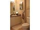 Charming bathroom with a vanity, decorative accents, and a plush floor mat at 2060 Willow Hammock Cir # 201, Punta Gorda, FL 33983