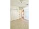 Bedroom featuring a ceiling fan and a double door closet at 2060 Willow Hammock Cir # 201, Punta Gorda, FL 33983