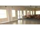 Well-lit clubhouse area featuring large windows, billiard table and comfortable seating at 2060 Willow Hammock Cir # 201, Punta Gorda, FL 33983