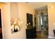 The foyer features a console table, decorative accents, and a view of other rooms at 2060 Willow Hammock Cir # 201, Punta Gorda, FL 33983