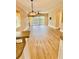 Spacious living room featuring hardwood floors and views to the patio at 2060 Willow Hammock Cir # 201, Punta Gorda, FL 33983