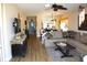 Spacious open-concept living room with wood flooring, adjacent dining area, and comfortable seating at 2060 Willow Hammock Cir # 201, Punta Gorda, FL 33983