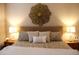 Tastefully decorated main bedroom features stylish lamps and a king-sized bed at 2060 Willow Hammock Cir # 201, Punta Gorda, FL 33983