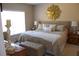 Cozy main bedroom featuring a well-decorated, comfortable king-sized bed at 2060 Willow Hammock Cir # 201, Punta Gorda, FL 33983