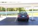 Designated parking space with covered awning to protect your vehicle from elements at 2060 Willow Hammock Cir # 201, Punta Gorda, FL 33983