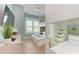 Bright bedroom with built-in bunk beds, natural light, and a playful, nautical theme at 215 83Rd St, Holmes Beach, FL 34217