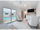 Bright sitting room with pool access, neutral decor, mini bar, and comfortable seating at 2308 Tulip St, Sarasota, FL 34239