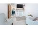 Charming sitting room featuring a mini bar, comfortable seating, and stylish decor at 2308 Tulip St, Sarasota, FL 34239