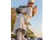 Statue of a sailor kissing a nurse with cars and palm trees in the background on a sunny day at 2308 Tulip St, Sarasota, FL 34239