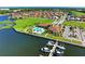 Aerial view of community, marina, and clubhouse with pool at 2322 5Th E St, Palmetto, FL 34221