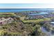 Aerial view of a waterfront community with lush greenery and water access at 2322 5Th E St, Palmetto, FL 34221
